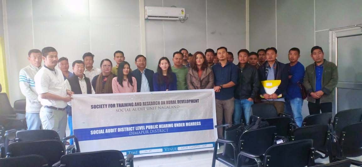 Project Director, DRDA Dimapur, H. Atokhe Aye and Director, Social Audit Unit and State Resource Person, Imlirenla Sanglir seen along with others during the Public Hearing in Dimapur on Saturday. (Morung Photo)